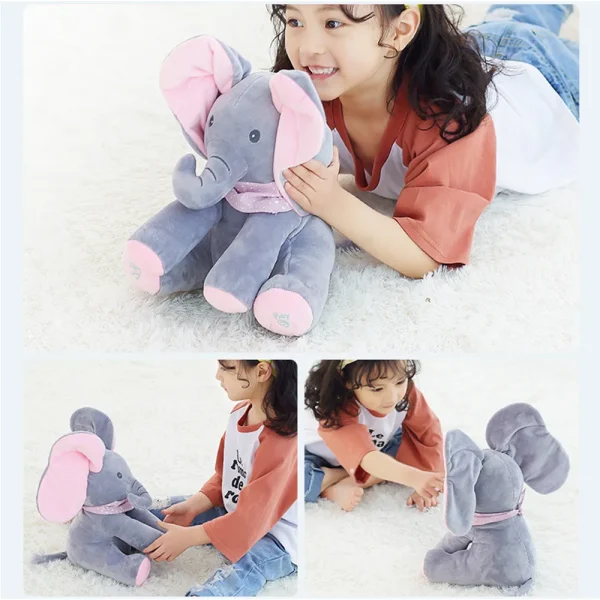 ילדה קטנה משחקת עם בובה פיל.