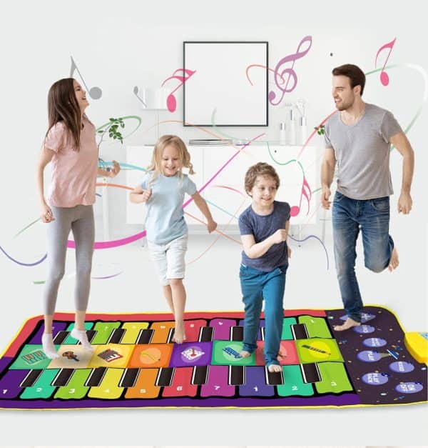 A family is playing music on a שטיח ריקוד לילדים.